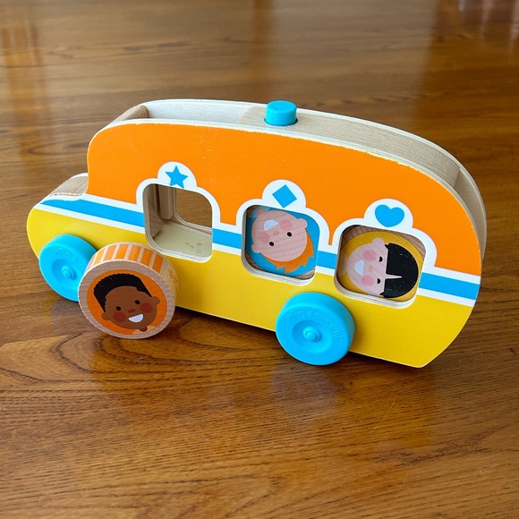 Melissa & Doug GO Tots
Wooden Roll & Ride Bus with 3 Disks - Picture 6 of 6